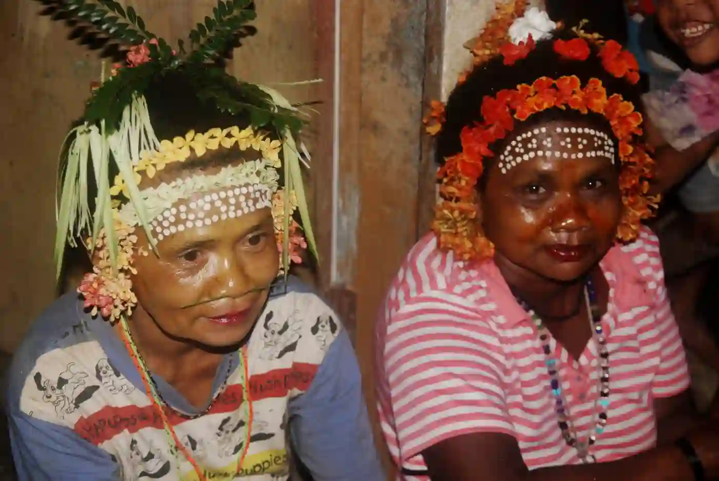 Two women of the Batek tribe with face paints