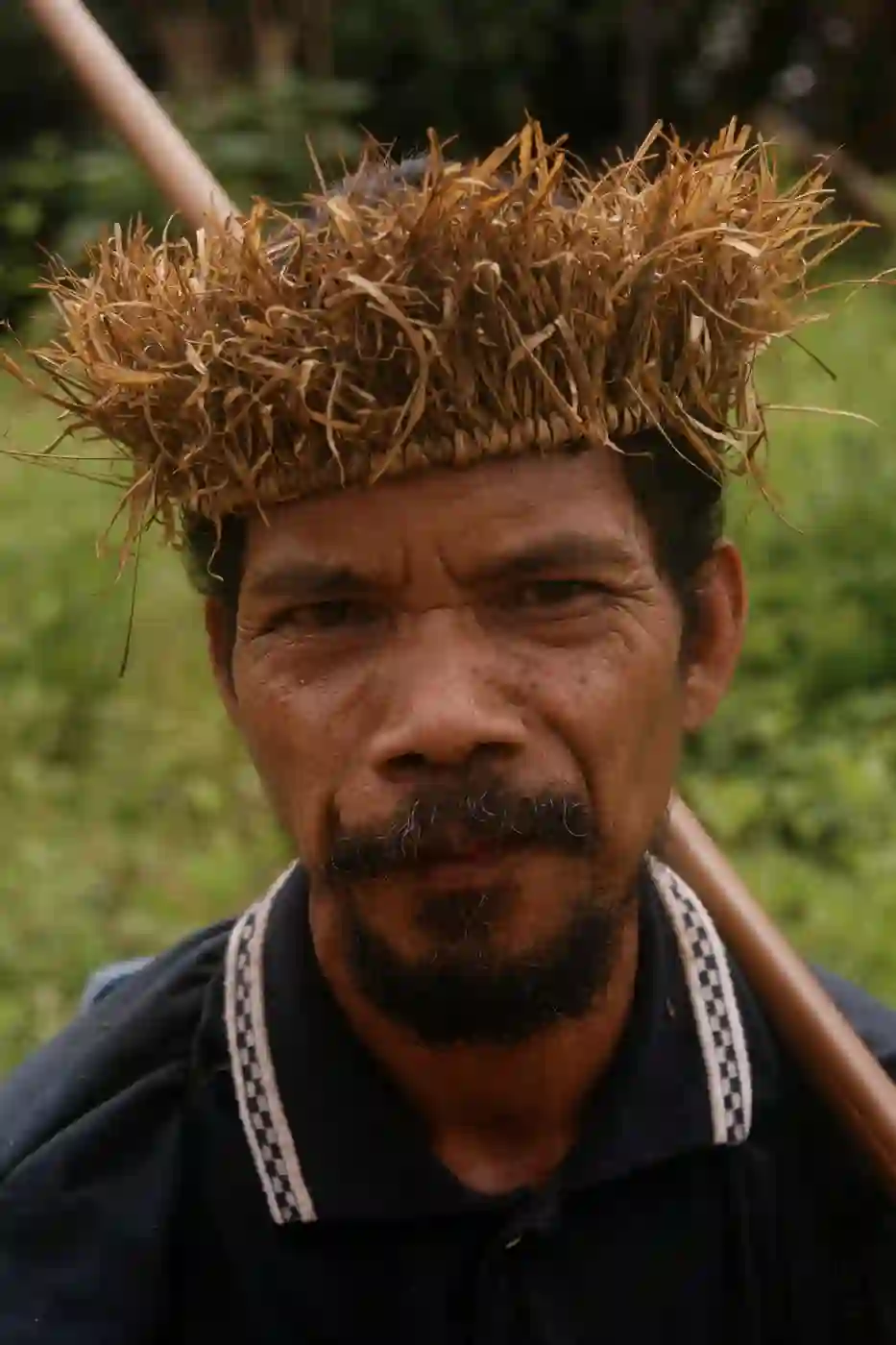 A Temiar man with blowpipe.